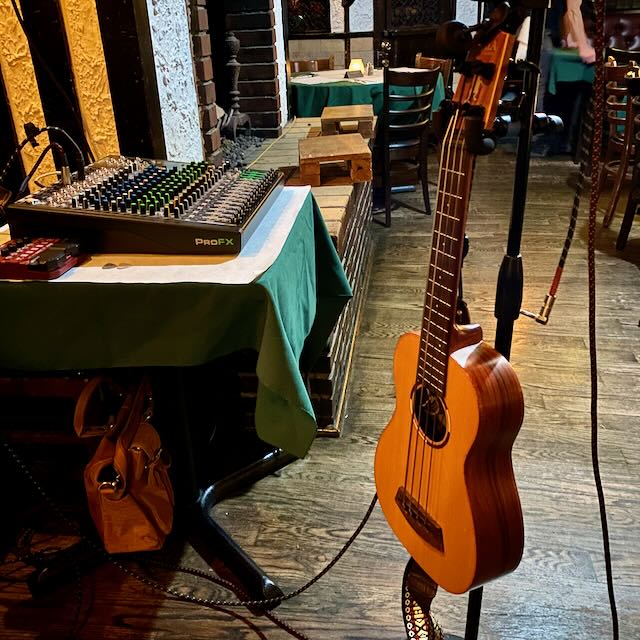 A Kala Ubass hanging on a stand.